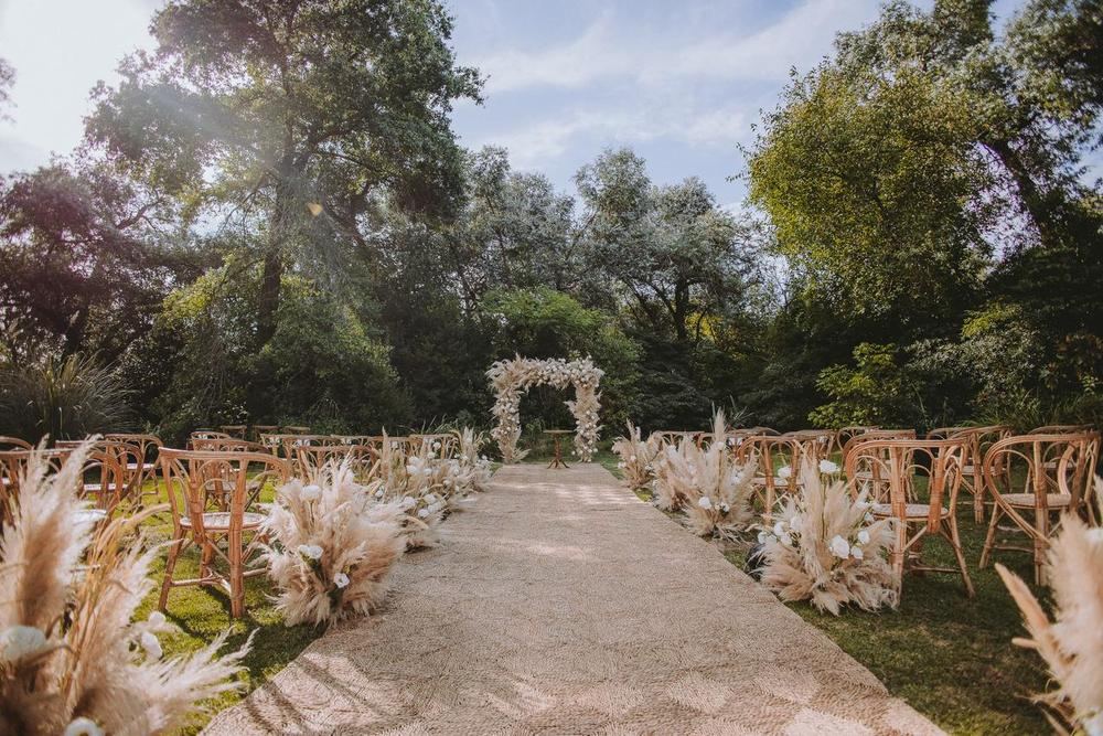 Ceremonia Exterior con Arco Floral